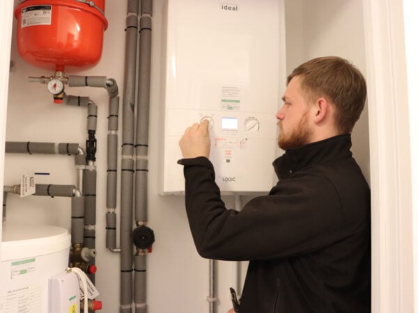 Gas engineer working on a boiler