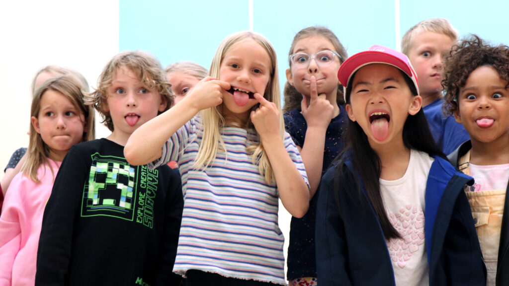Group of kids posing for their photo
