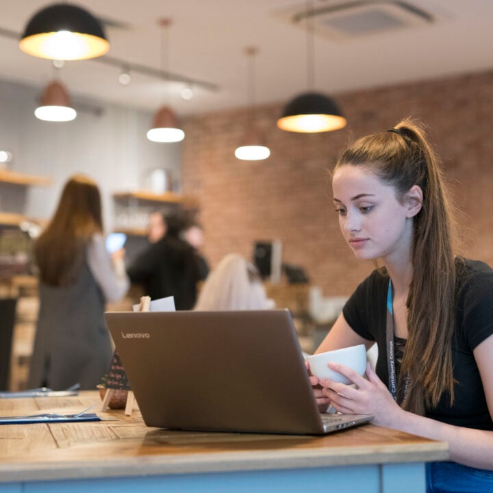 Student sitting in the refectory