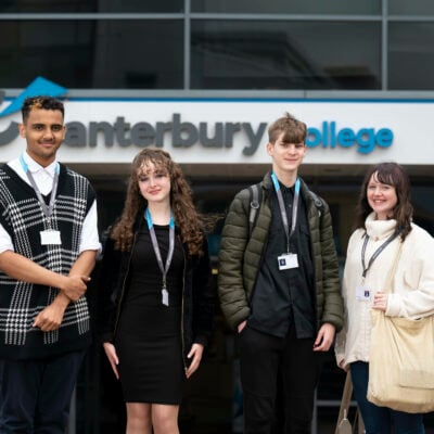 Students standing outside the campus