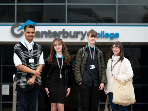 Students standing outside the campus