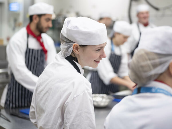 Catering students working in the kitchen