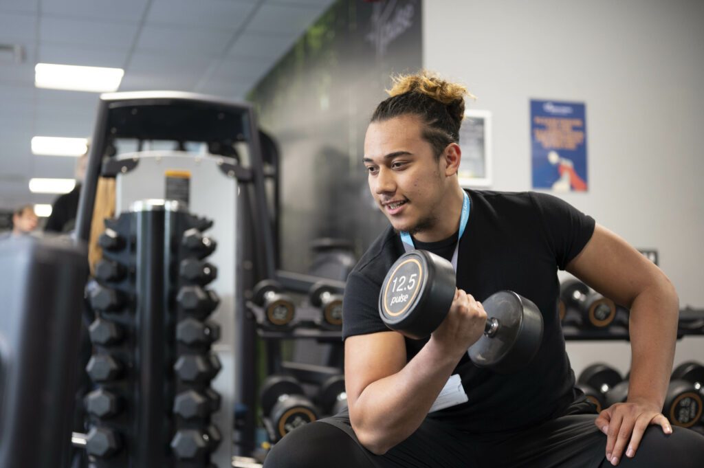 Sport student working out in the gym