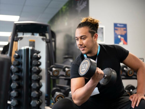 Sport student working out in the gym