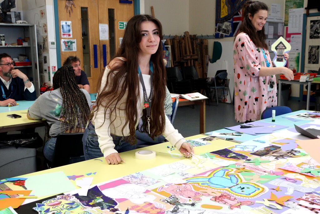 art student with work in the art studio