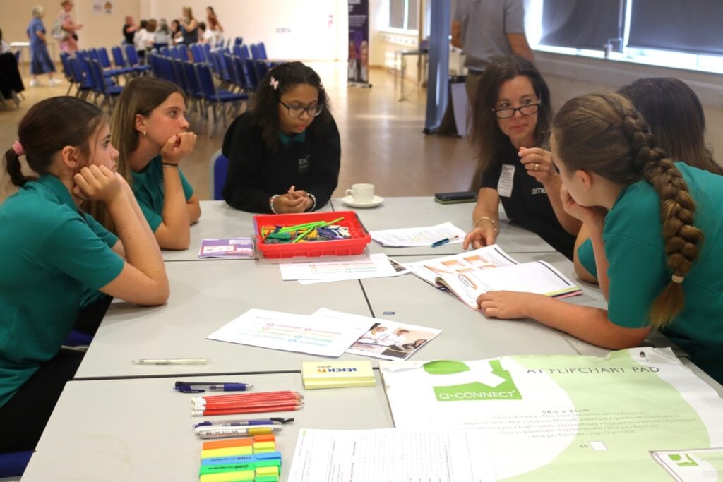 students discuss bridge project