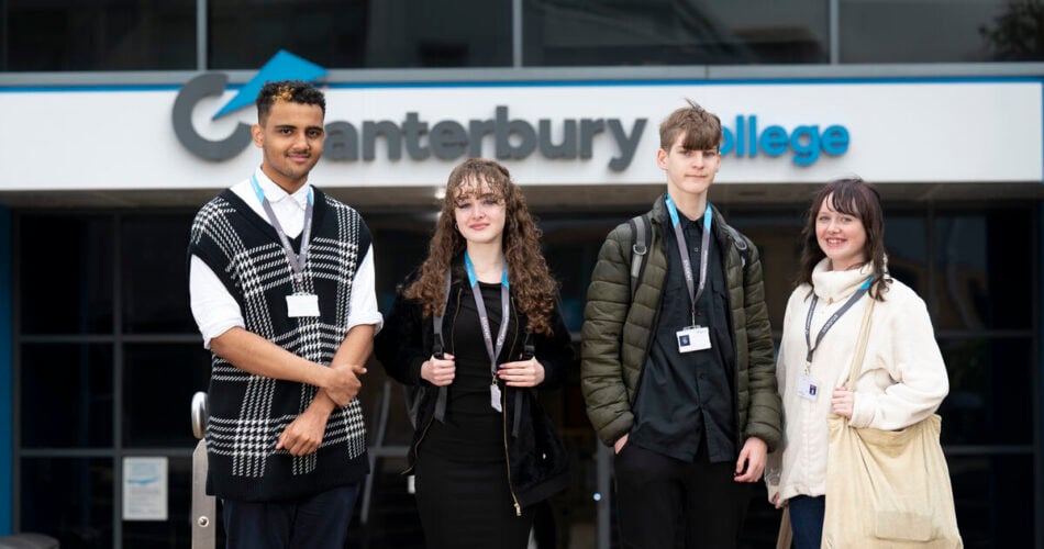4 students standing outside a College