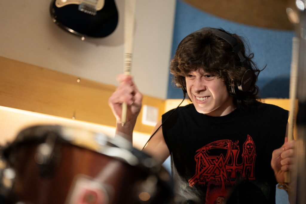 Student playing the drums