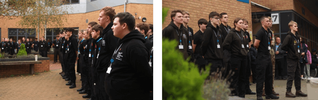 Uniformed Public Services students standing to attention as part of their army drill