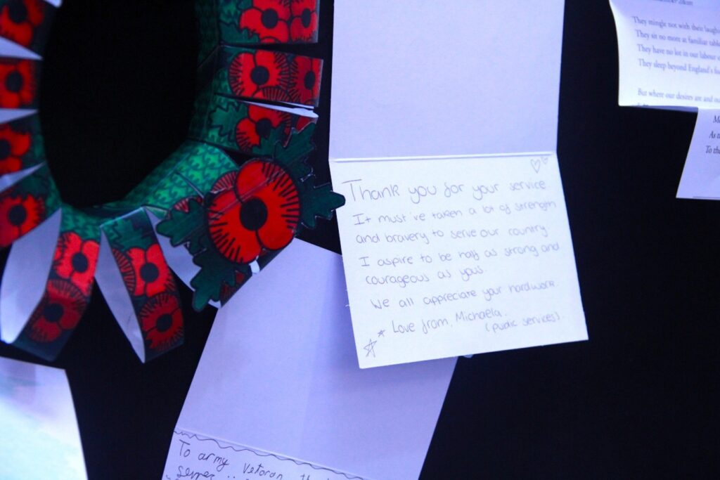 Close up of a thank you card written to soldiers