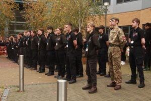 Public Services students standing to attention, in formation