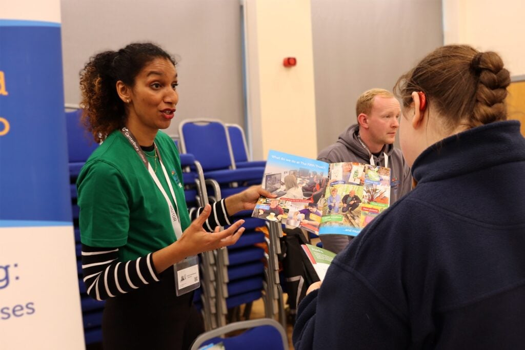 student and staff at SEND progression fair