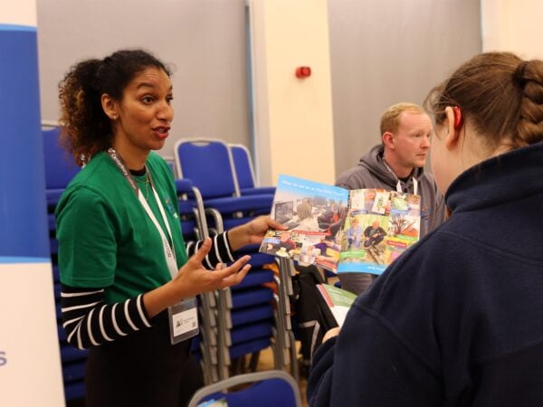 student and staff at SEND progression fair