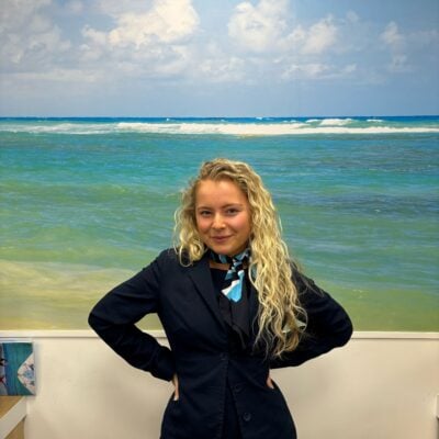 Young lady in travel agents uniform