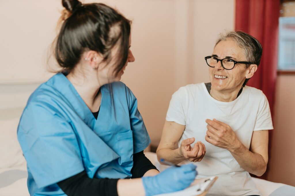 Health care worker with patient