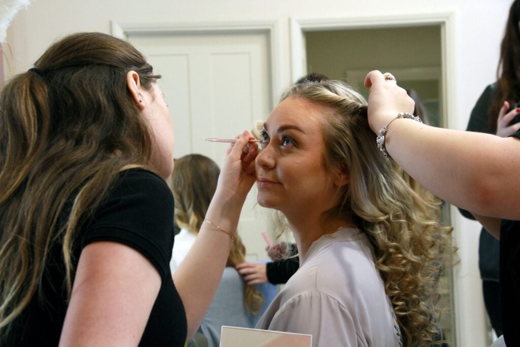 Make up being applied to a model's face