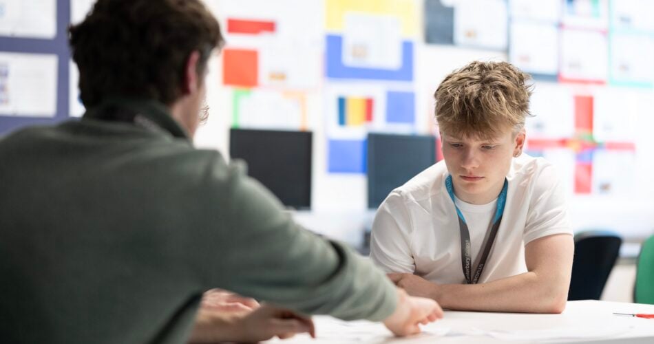 foundation teacher supporting a student