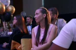 Lady in audience smiling