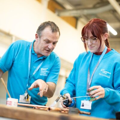 Plumbing student with lecturer at EKC Canterbury College