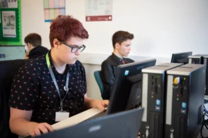 computing student working on a computer