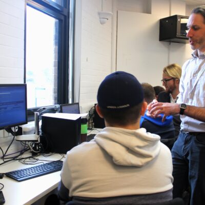 students interact with a guest speaker