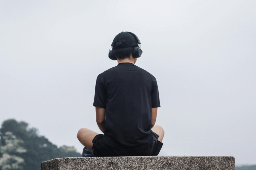 student listening to music with headphones