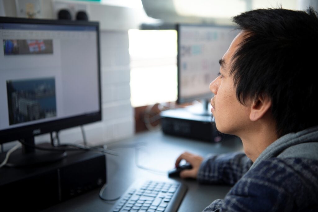 student looking at computer