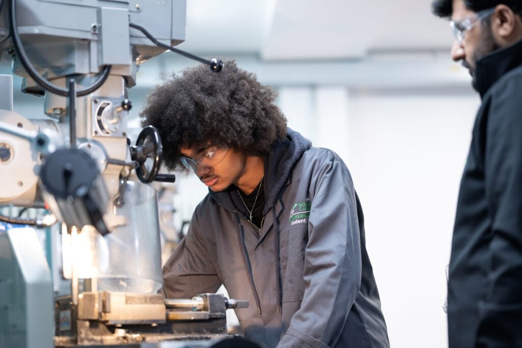 Student using machine in Engineering workshop