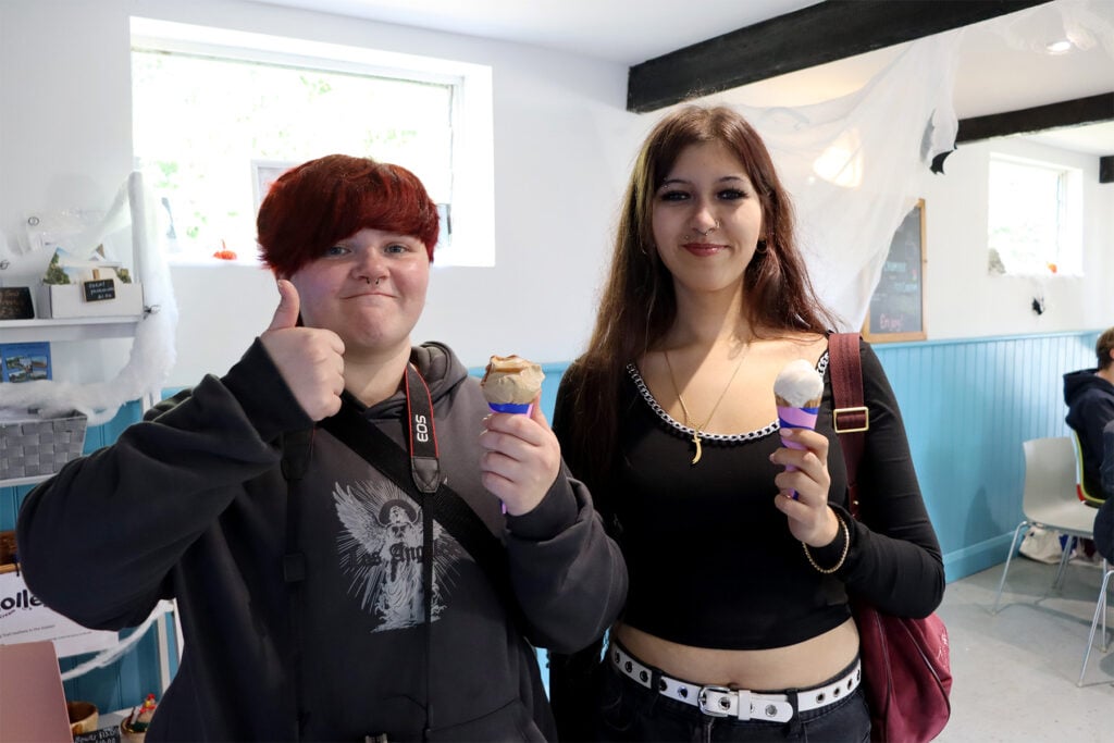 two students give a thumbs up to Solley's ice cream