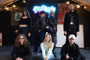 a group of art and design students take a group photo at Solley's ice cream