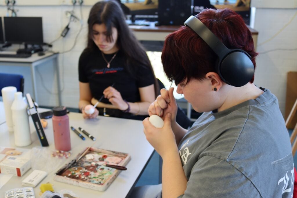 art and design students create eggs to sell to fundraise during community week