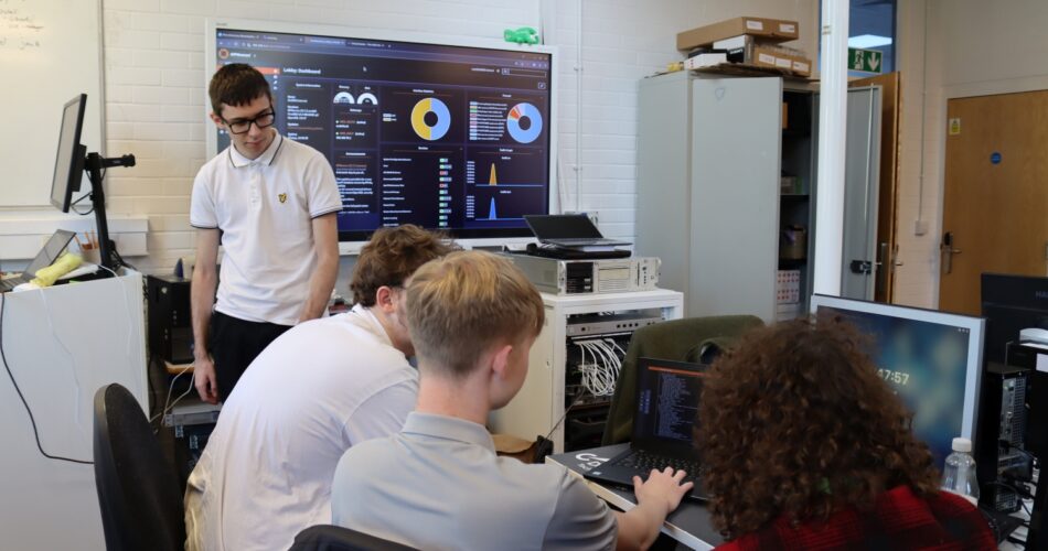 students work together during a computing workshop