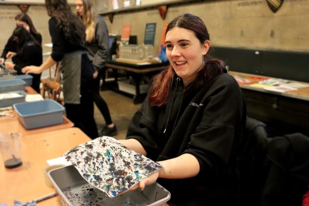 Student presenting art work