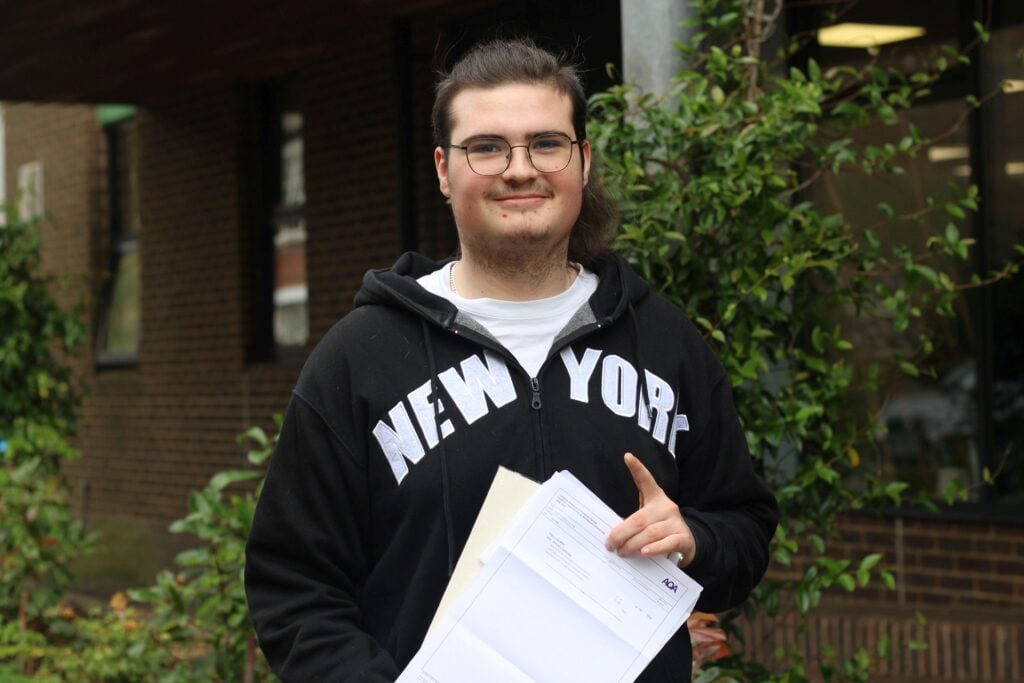 Student receives his GCSE results at EKC Dover College.