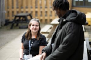 students talking to each other outside