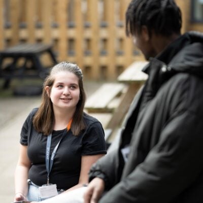 students talking to each other outside