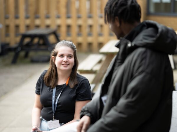 students talking to each other outside