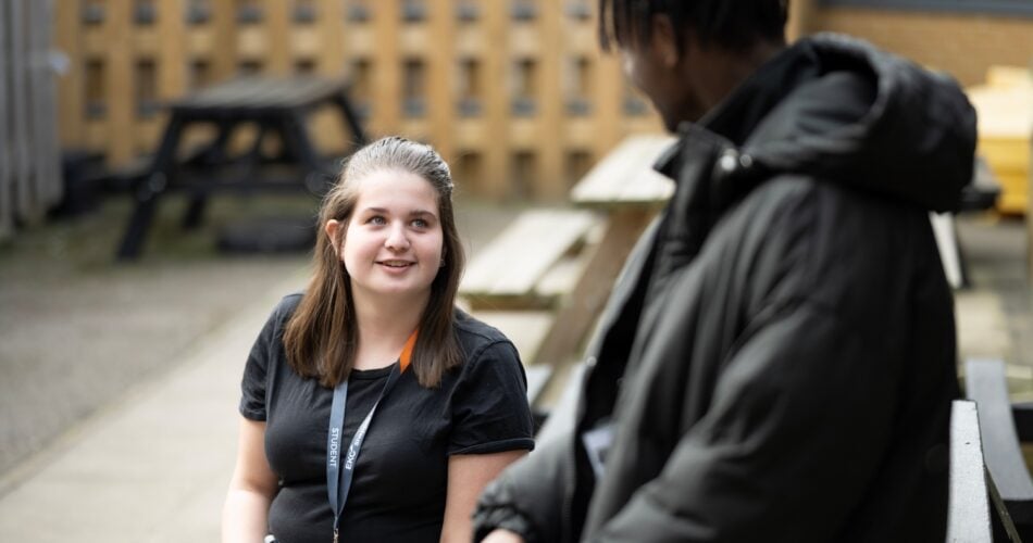 students talking to each other outside