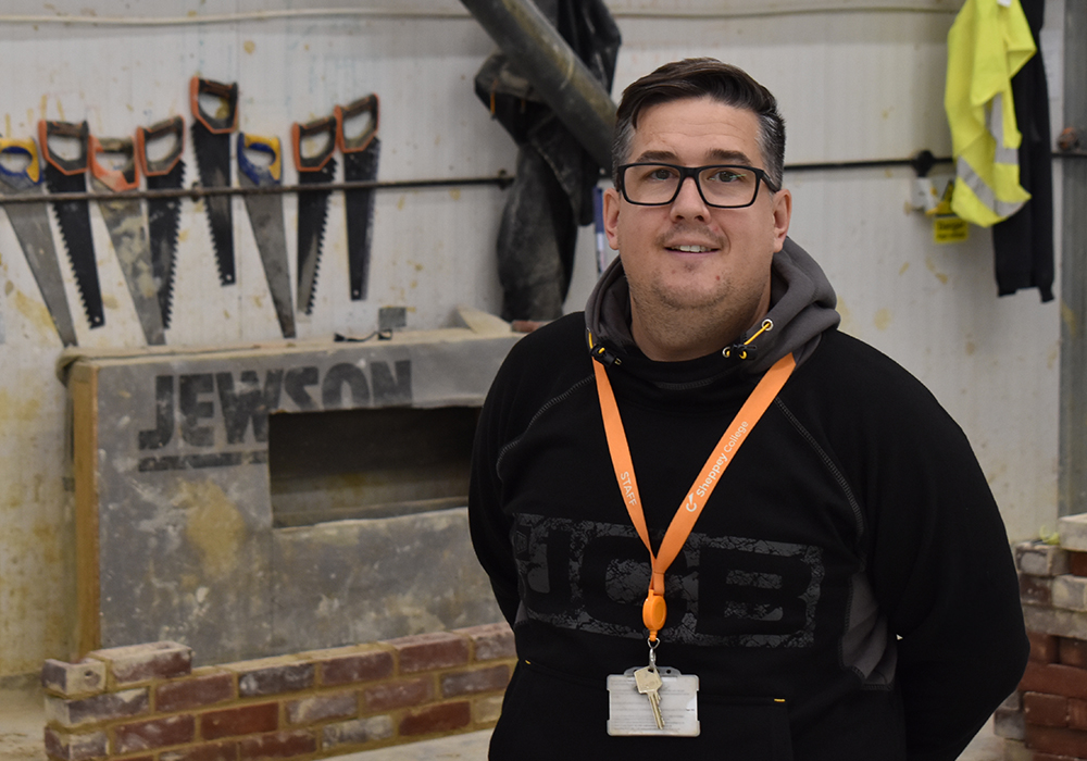 headshot of programme director Daniel