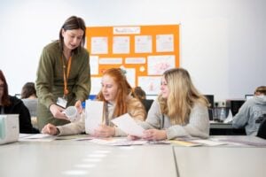 business students with lecturer