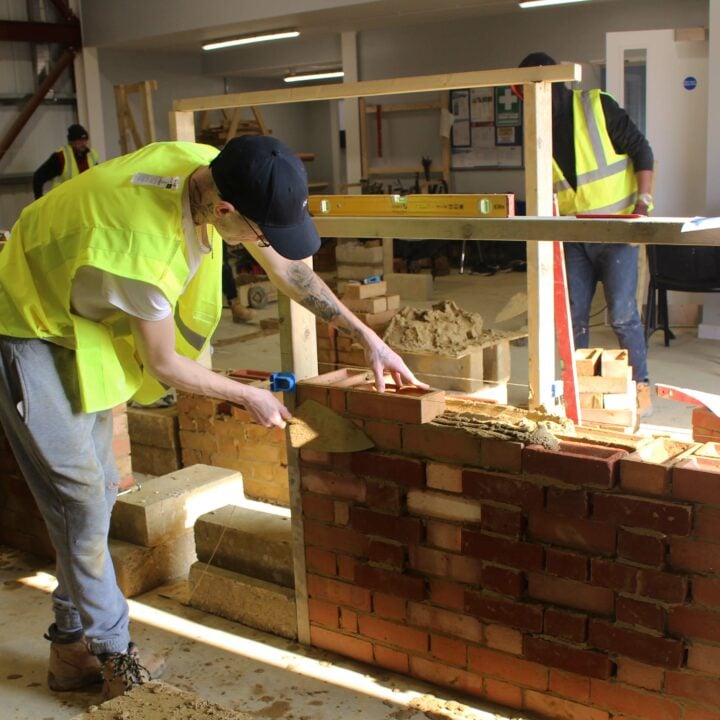 Bricklaying student working on an end piece assessment