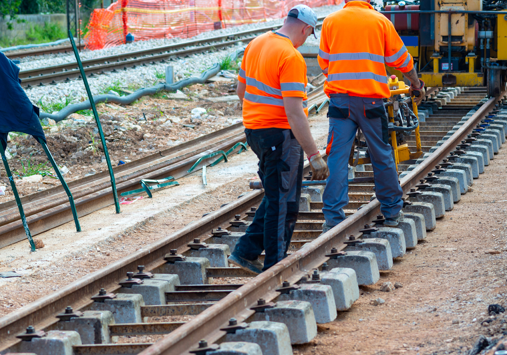 Rail engineers walking along the track