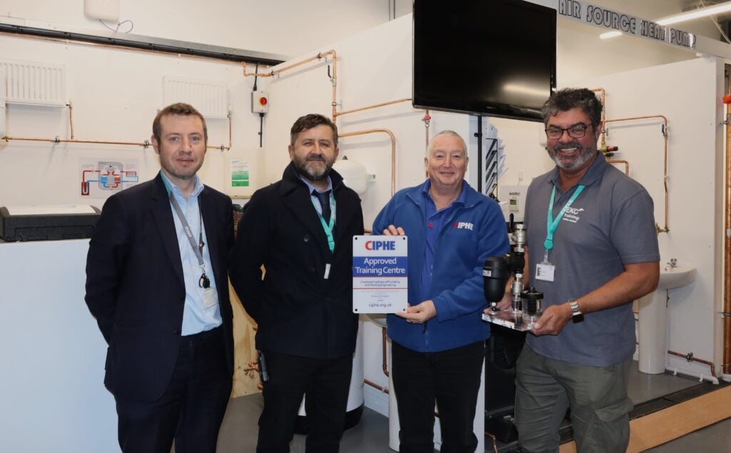 Head of centre and CIPHE lead giving award