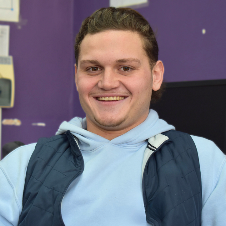 Harvey smiling at the camera