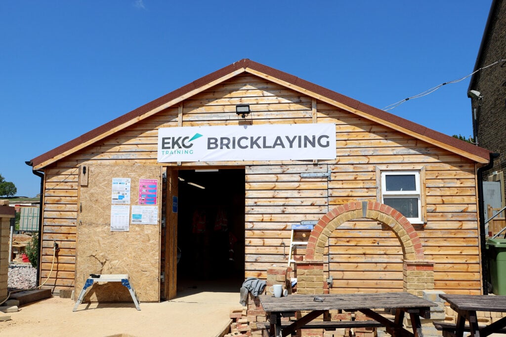 A shed workshop surrounded by bricks