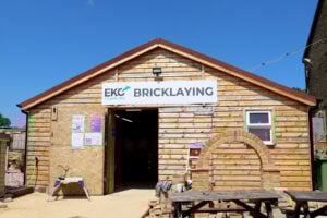 A shed workshop surrounded by bricks
