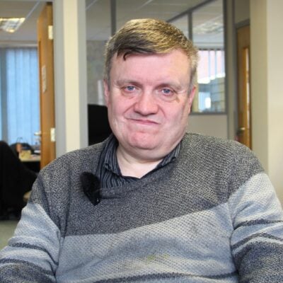 gary smiling at the camera