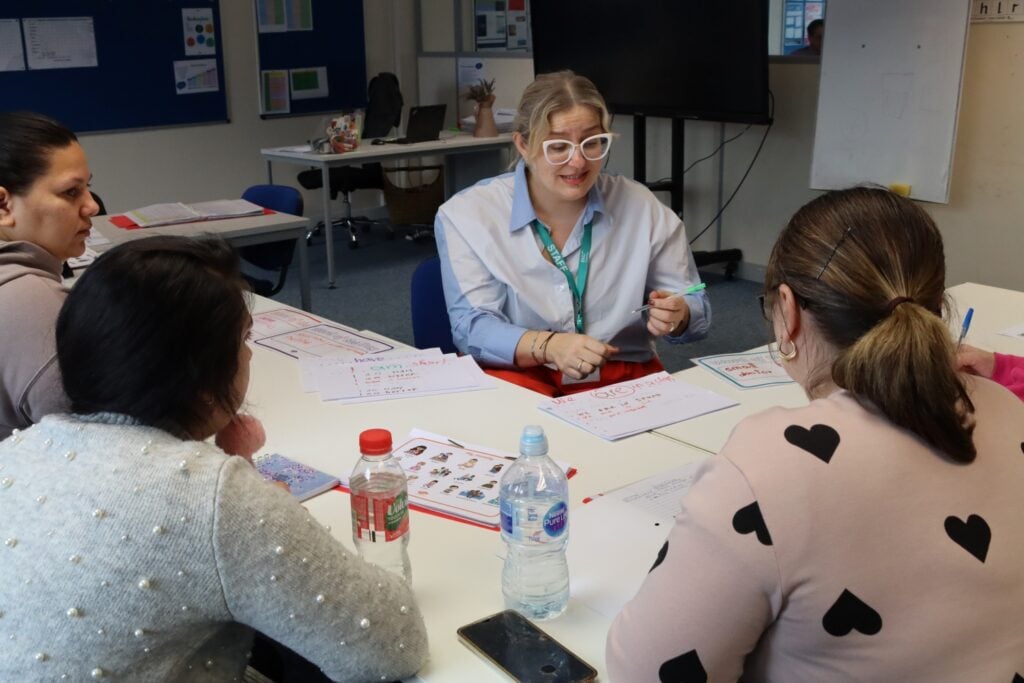 ESOL lecturer teaching adult students