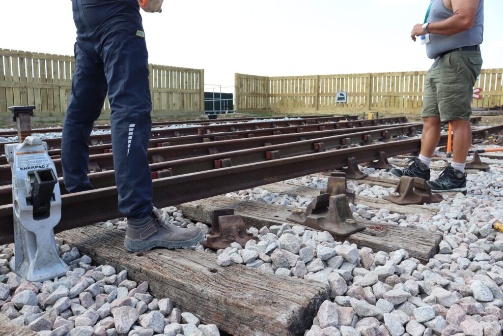 Students stood by the rail track