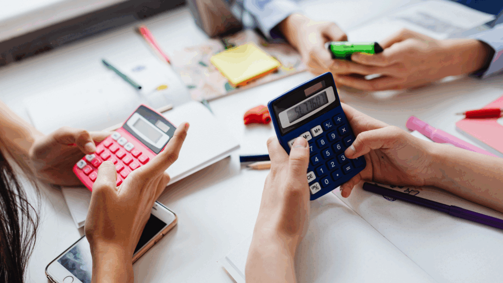 3 students using a calculator